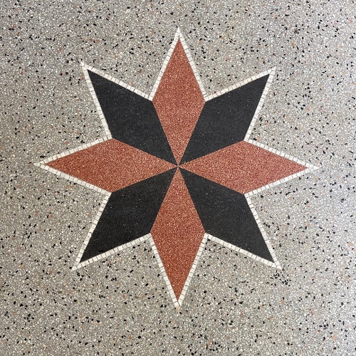 Terrazzo Berlin rot schwarze Arabeske